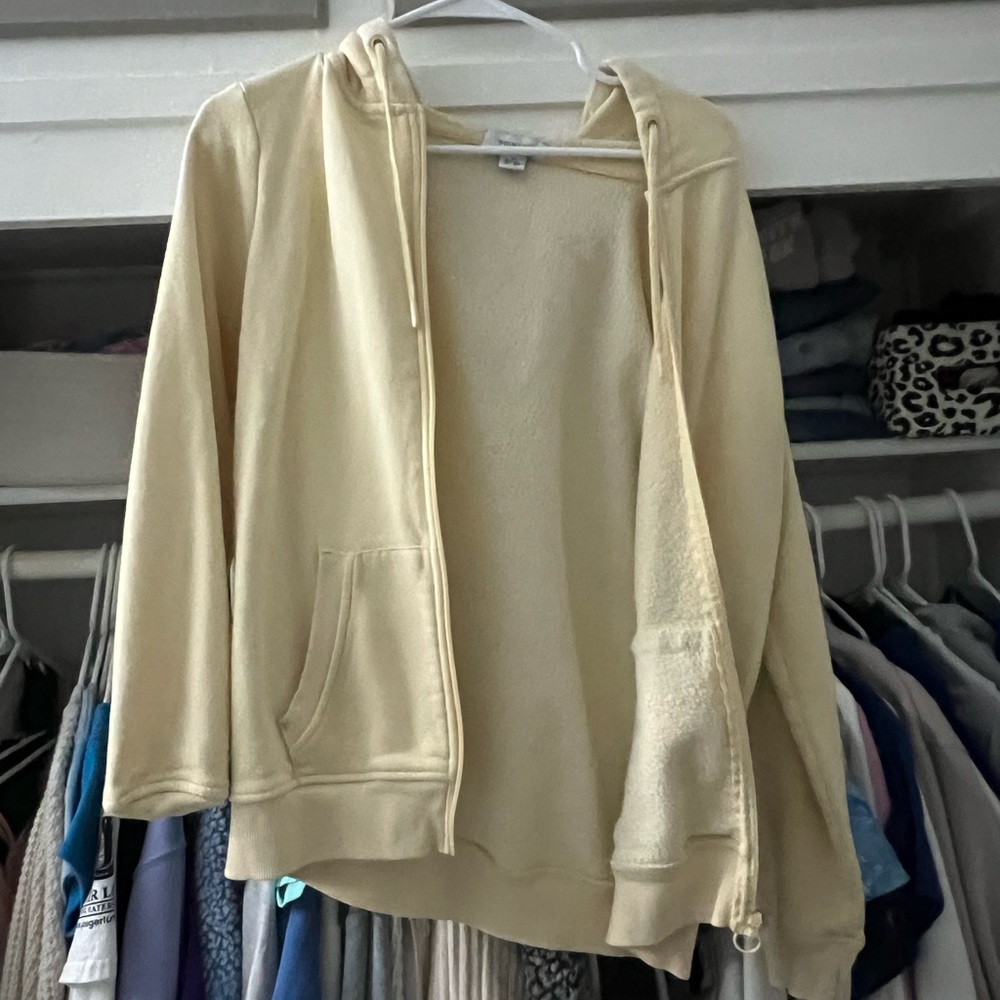 yellow zip up